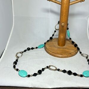 Long necklace. Dyed howlite, glass crystals and I suspect pewter.